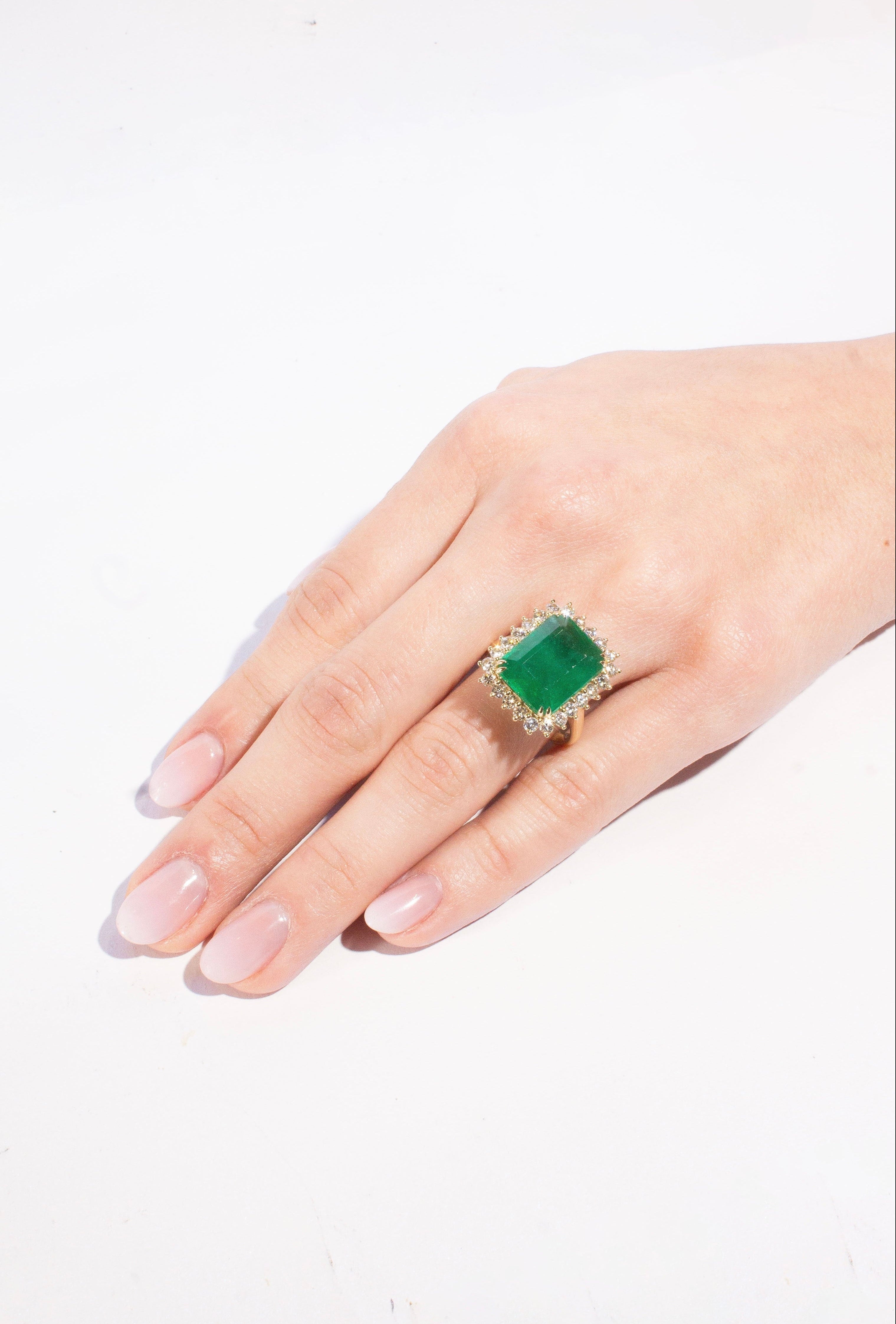 Halo Step Cut Emerald Ring