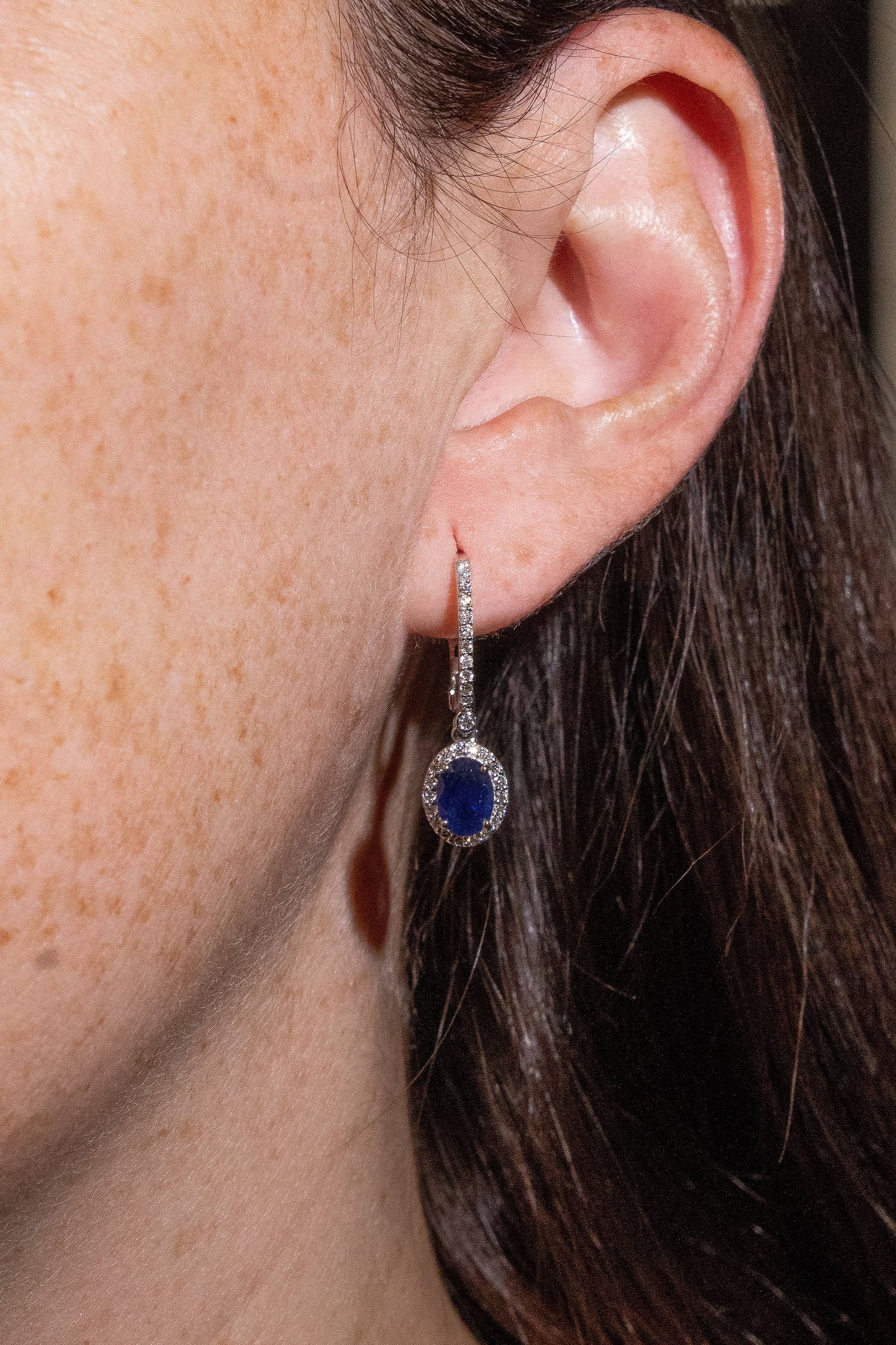 Hanging Oval Blue Sapphire Halo Earrings Secondary image